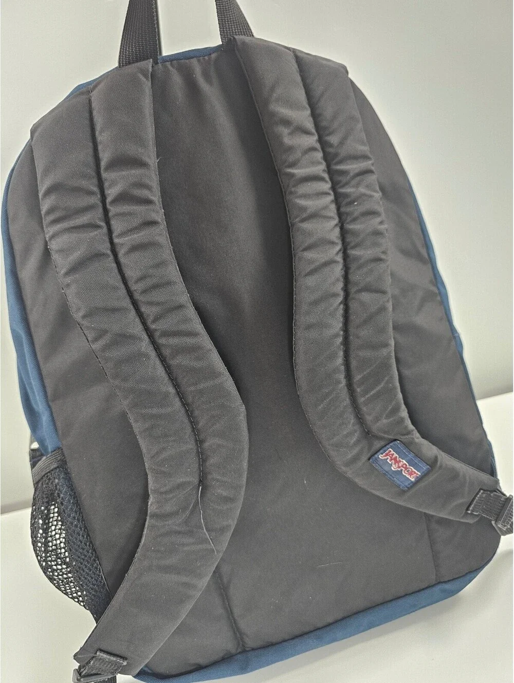 JanSport Classic Navy Blue Backpack with Multiple Compartments